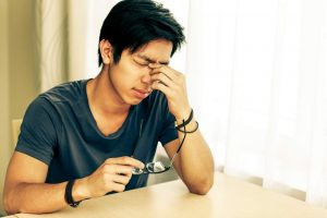man with stress headache anxiety