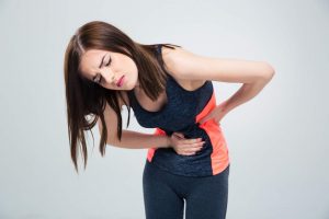 woman with upset stomach