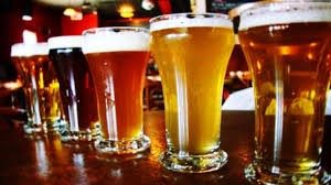 beer glasses on bar counter