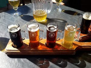 glasses with different colored beers