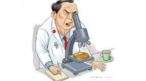 scientist with microscope