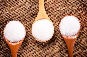 salt on wooden spoons
